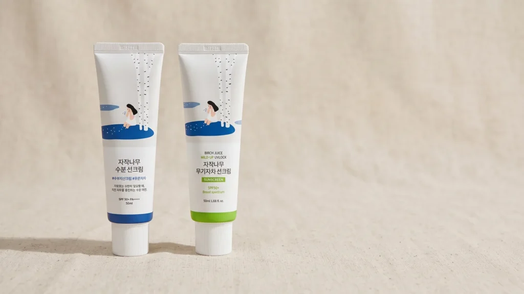 ROUND LAB Birch Juice Sunscreen SPF50 kremas nuo saulės ir ROUND LAB Birch Juice Moisturizing Mild Up Sunscreen apsauginis kremas nuo saulės – Geriausi SPF jautriai odai (korėjietiška kosmetika)